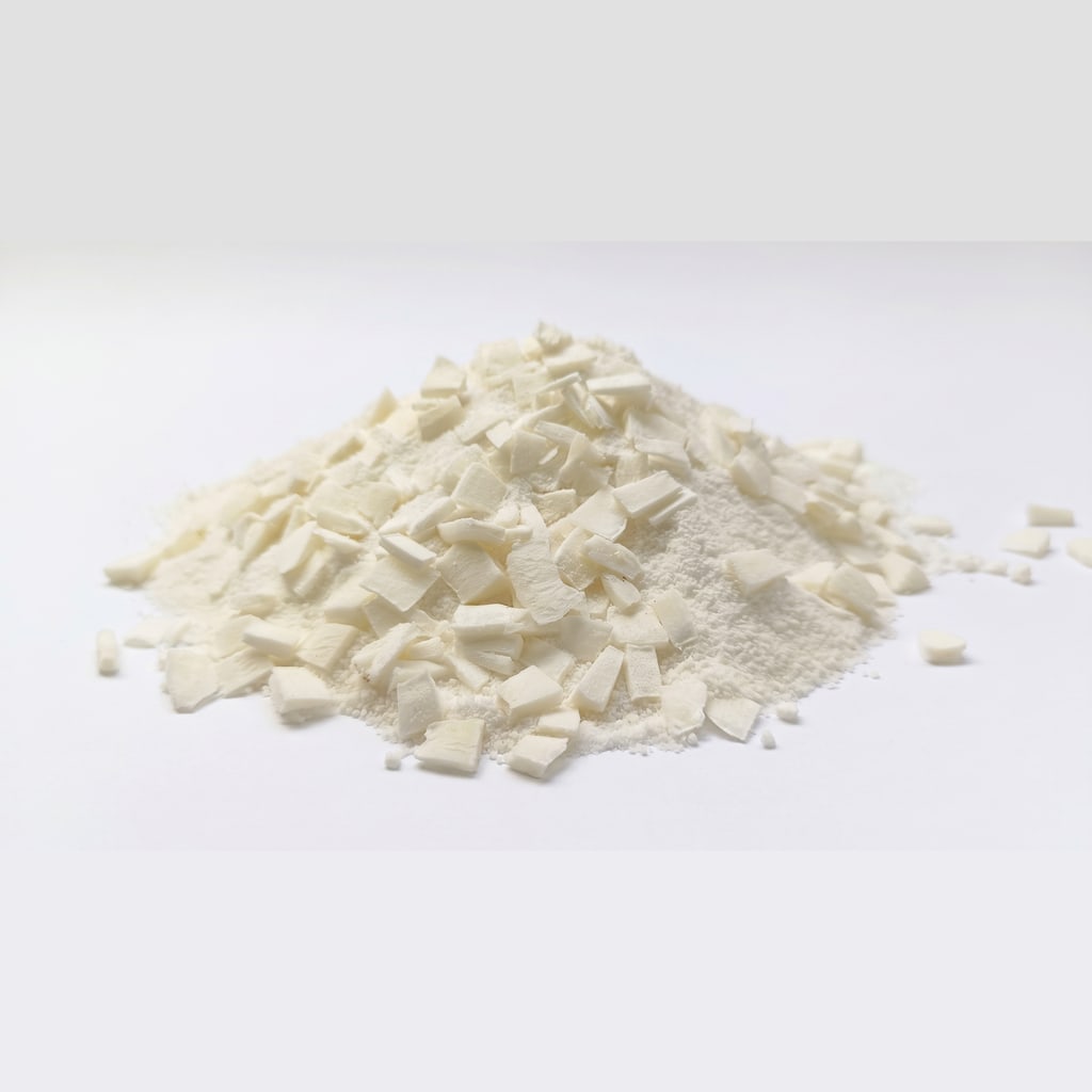 PrimeCoco coconut chunks water powder, pale cream powder with visible freeze-dried coconut pieces distributed through it
