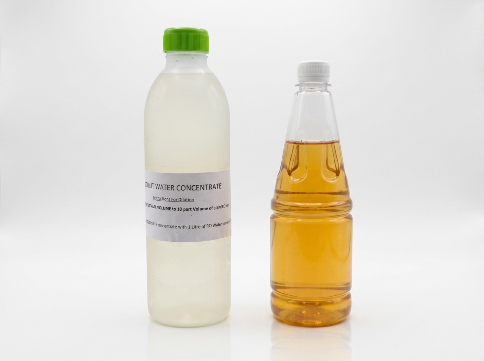 PrimeCoco low-heat coconut water concentrate samples, 60 to 82 Brix, in clear bottles
